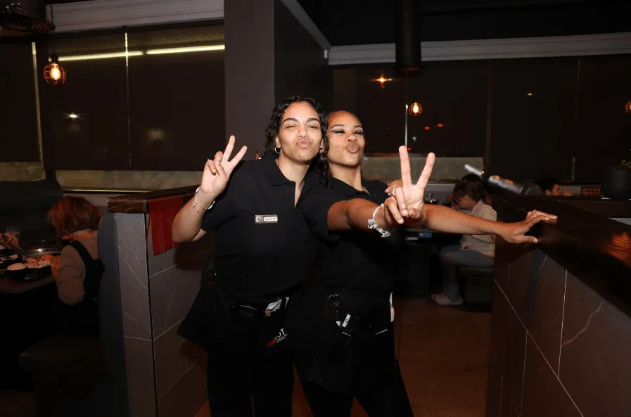 Two restaurant servers
